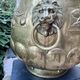 Large brass lion planter with a hallmark from the 19th century.