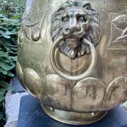 Large brass lion planter with a hallmark from the 19th century.