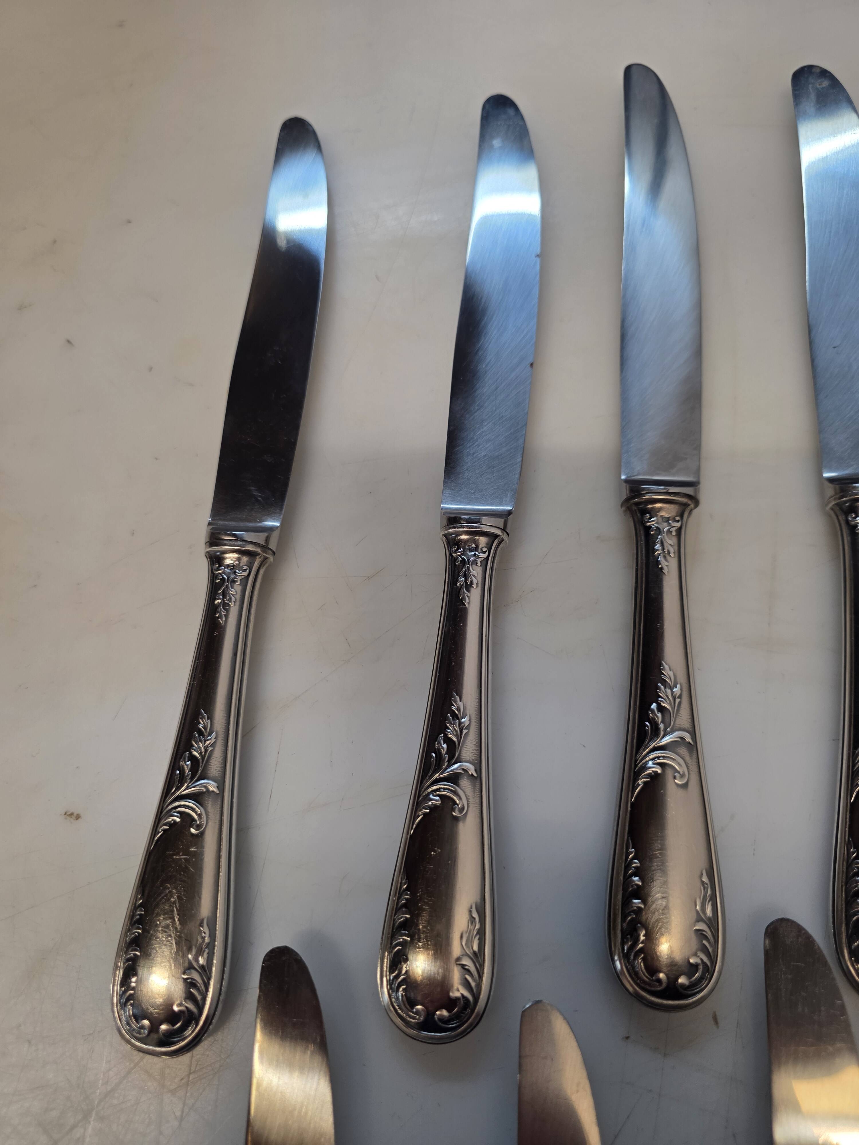 12 silver-plated knives