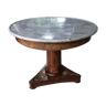 Pedestal table above marble