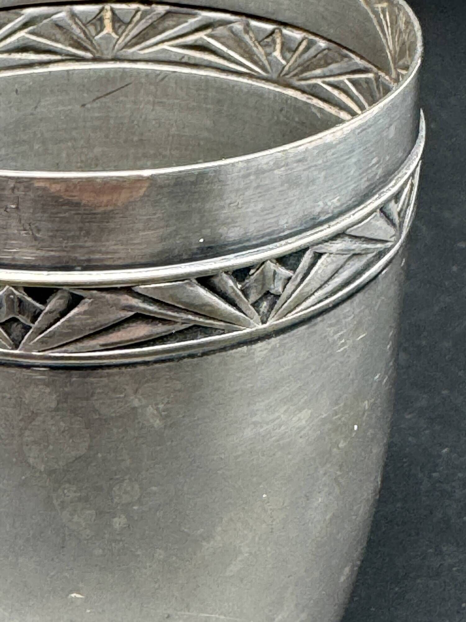 White metal (silverware) cup in its original box