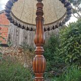 Turned wooden floor lamp with lampshade