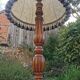 Turned wooden floor lamp with lampshade