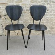 Pair of chairs with tapered metal legs and black Skaï, 60s