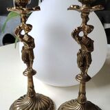 Pair of anthropomorphic candlesticks/Servants of the king holding the flame. In gilded bronze