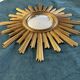 Vintage 1960s witch's eye sun mirror