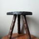 Tripod stool, horseshoe, rustic brutalist decoration.