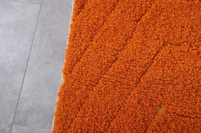 Handmade traditional natural wool rug in orange, size 1.5/2.5 m.