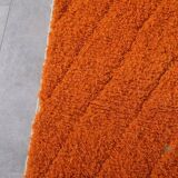 Handmade traditional natural wool rug in orange, size 1.5/2.5 m.