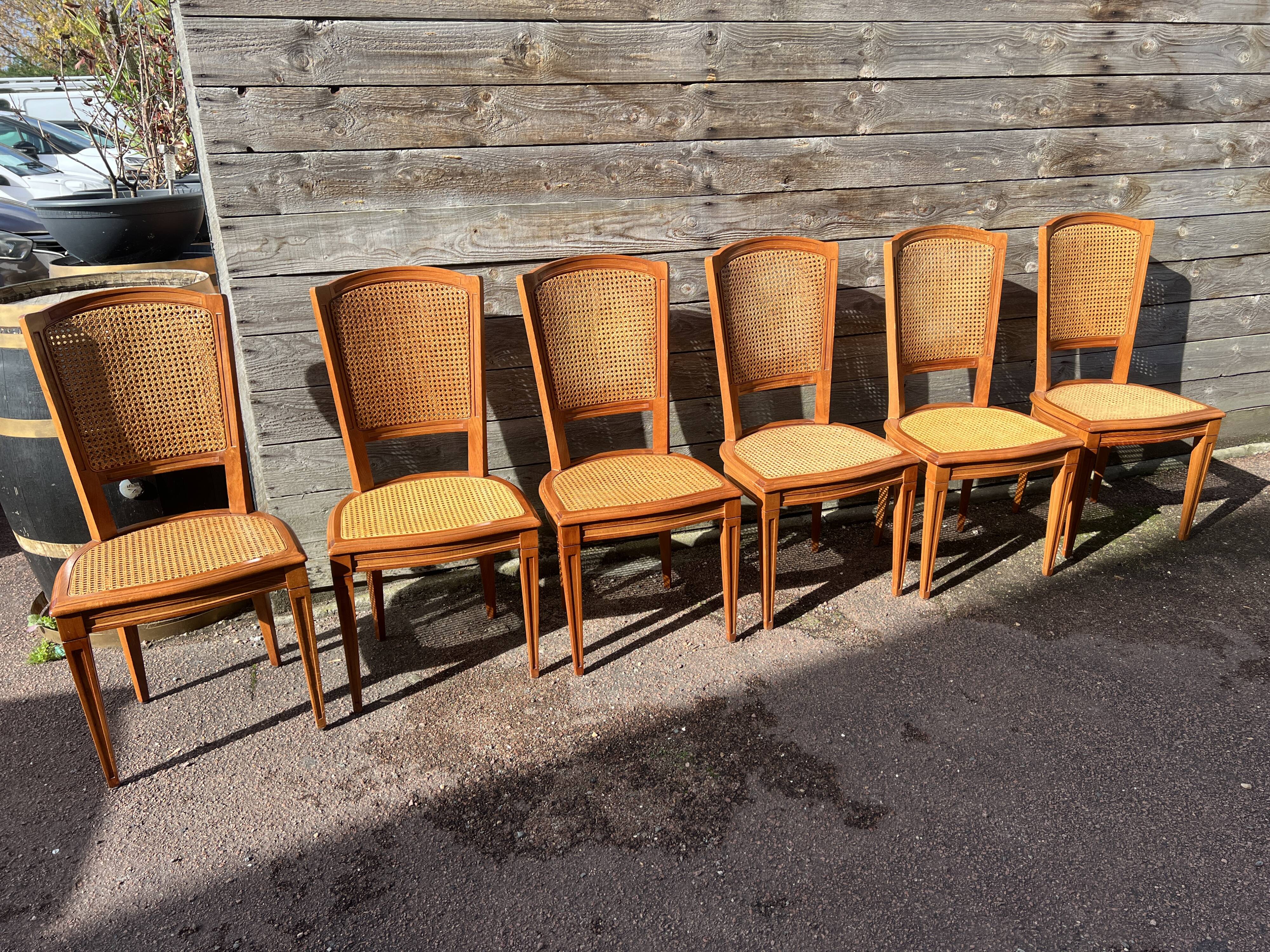 Six Art Deco chairs, 1960s, beech and cane