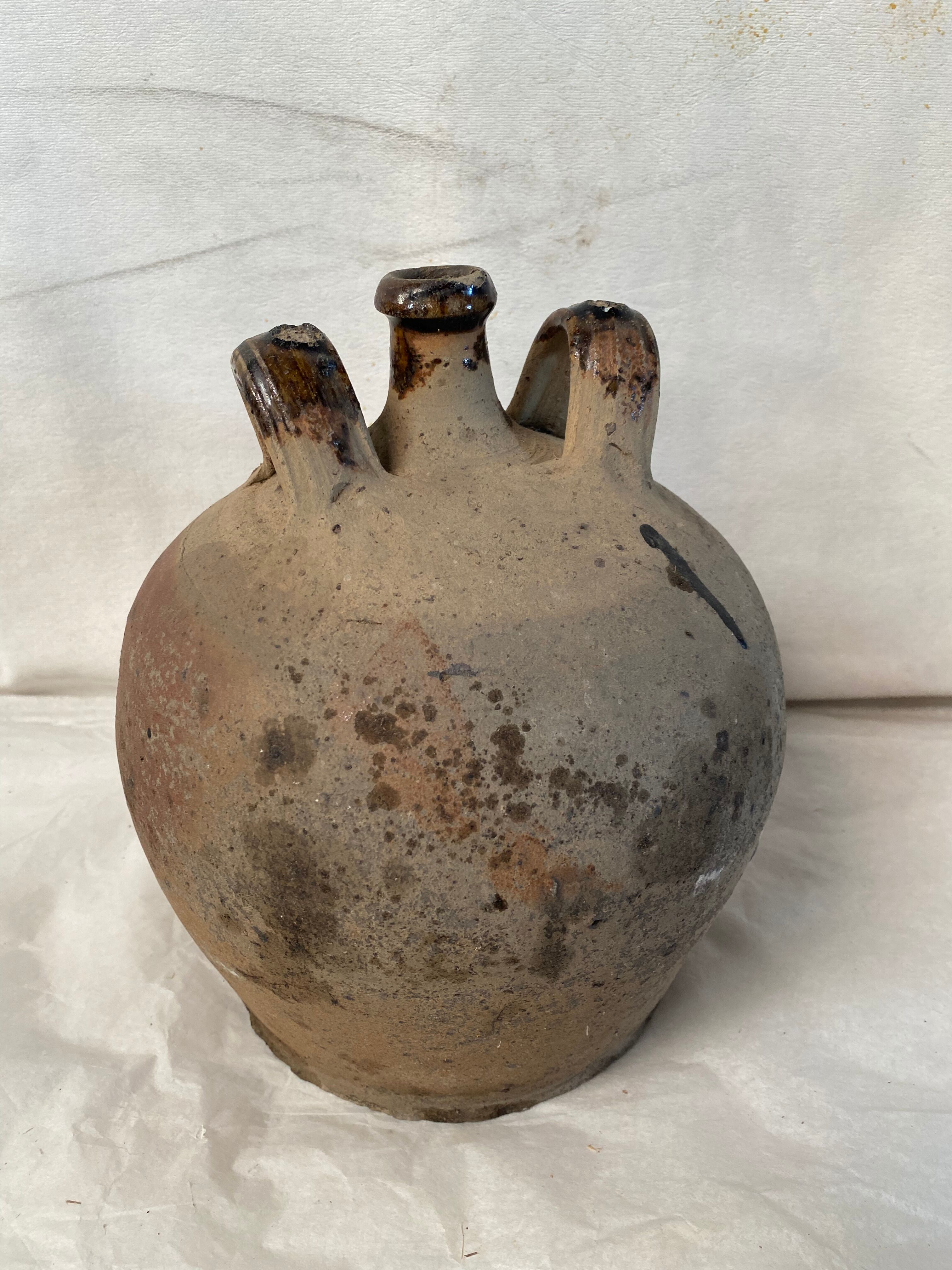 Vase jug in ancient sandstone