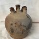 Vase jug in ancient sandstone