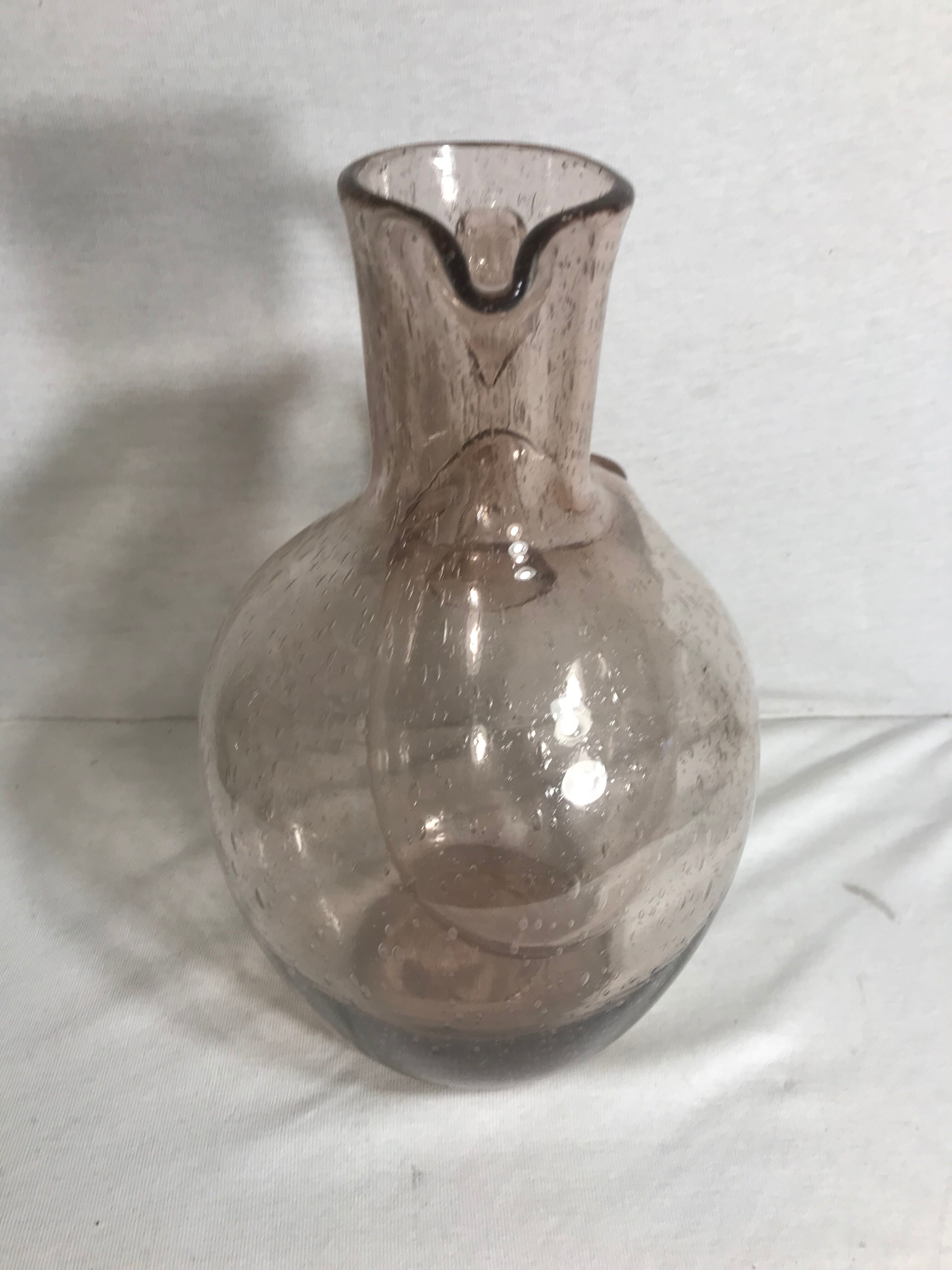 Bubble blown glass jug