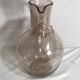 Bubble blown glass jug