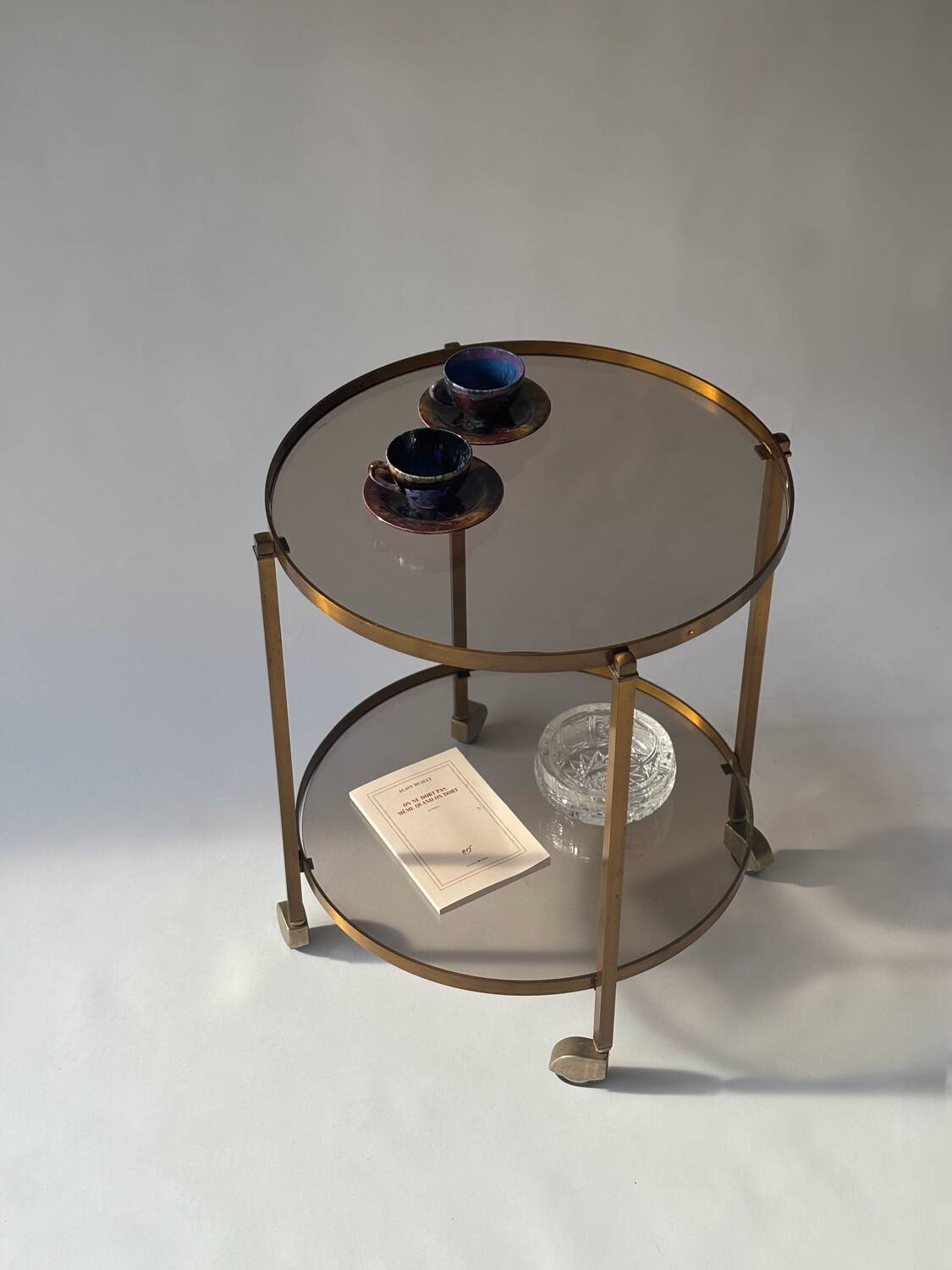 Rolling dessert trolley in brass and smoked glass, 1960