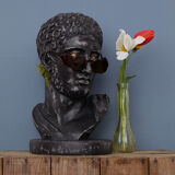 Greek head in waxed black plaster