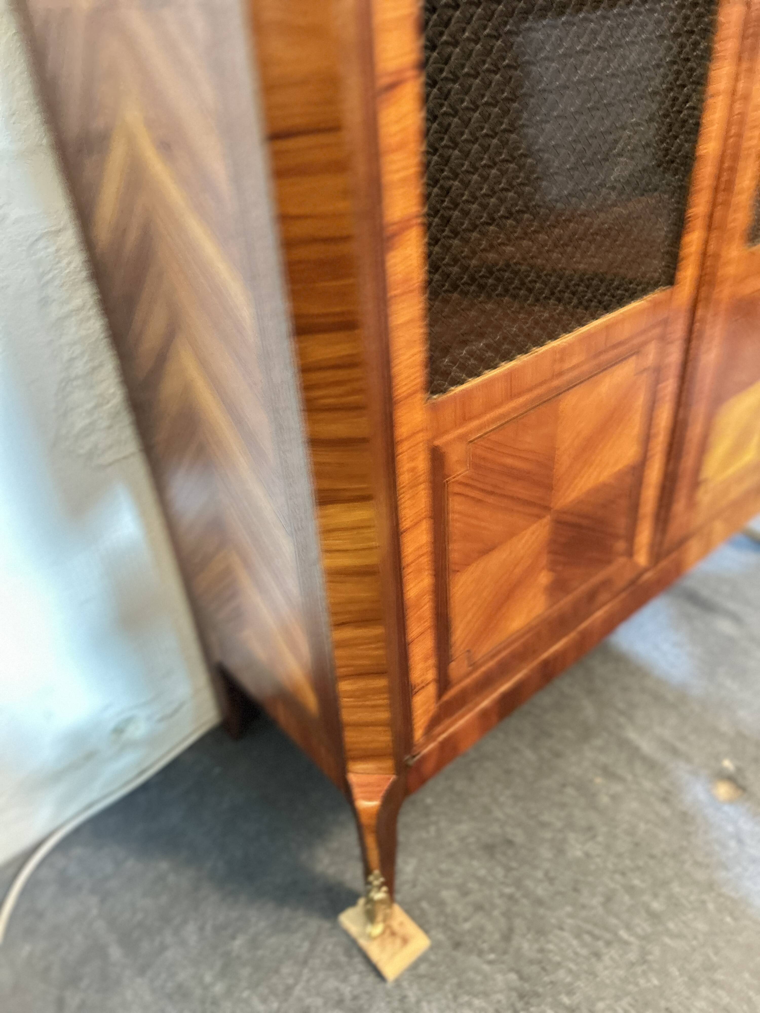 Directoire style display cabinet with two doors