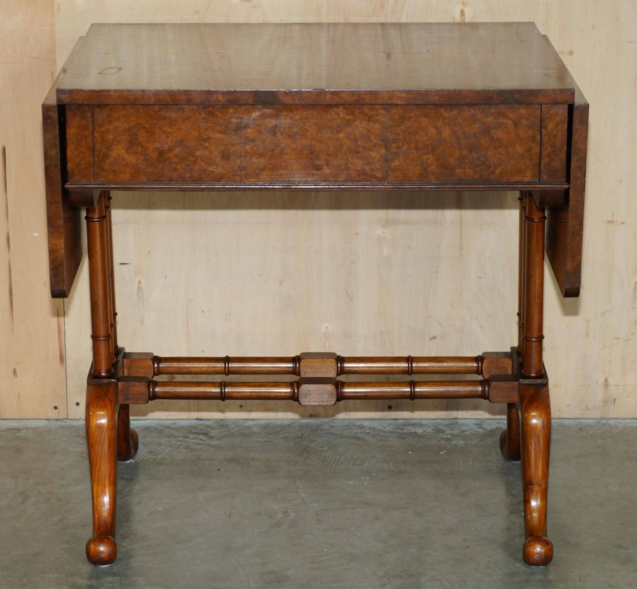Antique extendable coffee table circa 1880 in solid walnut.