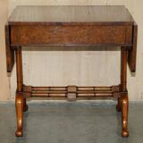 Antique extendable coffee table circa 1880 in solid walnut.