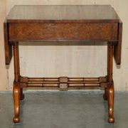 Antique extendable coffee table circa 1880 in solid walnut.