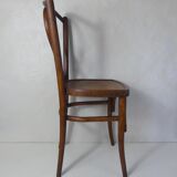 Old curved wooden bistro chair