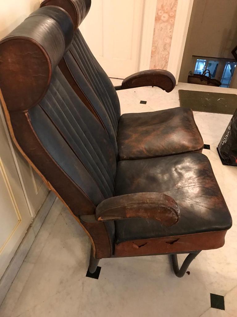 Vintage 1950s leather double-plane bus armchairs
