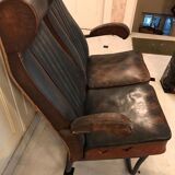 Vintage 1950s leather double-plane bus armchairs
