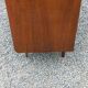 Vintage walnut varnished chest of drawers with 4 drawers from the 1960s.