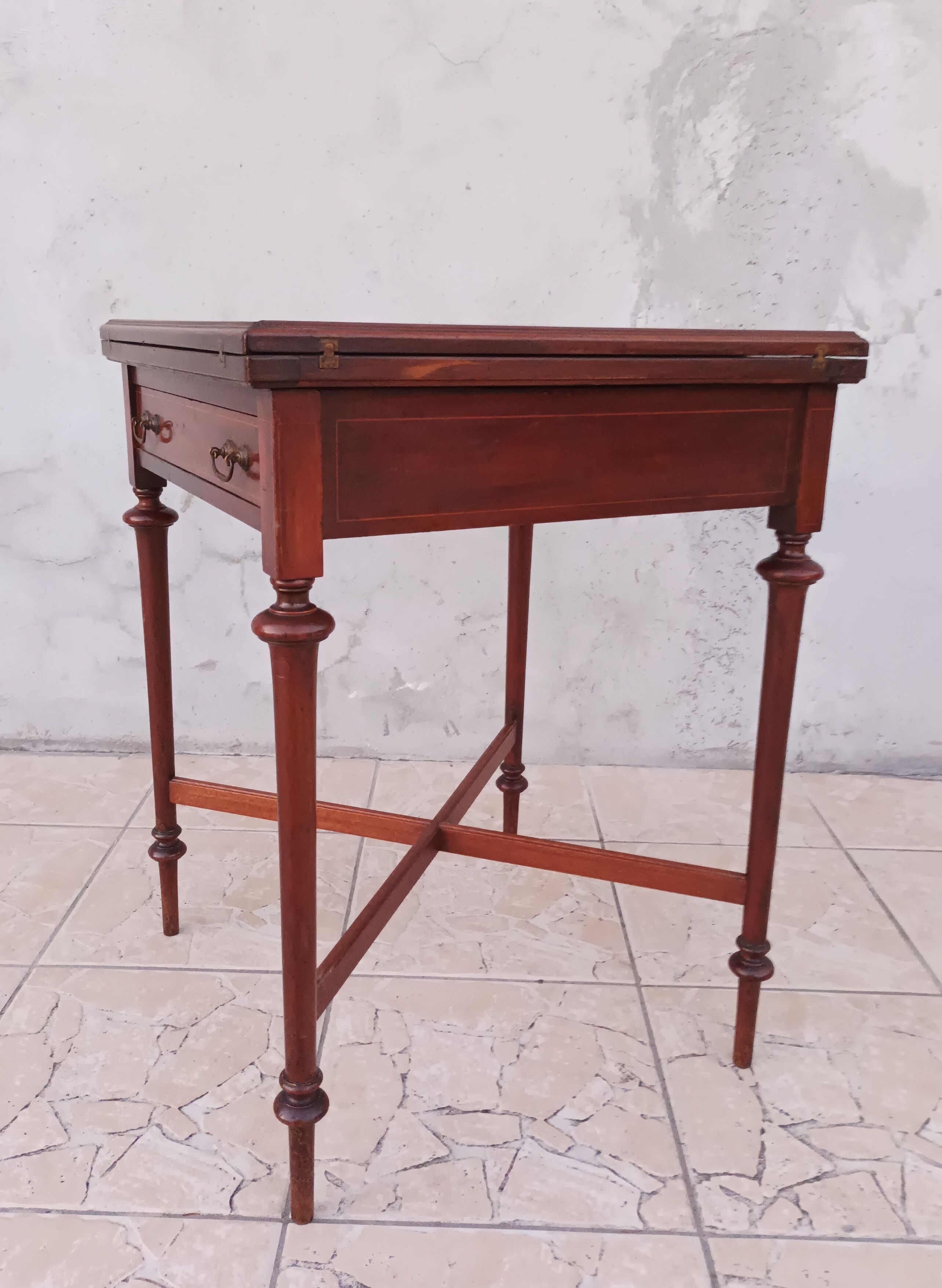 Game table in mahogany late 19th