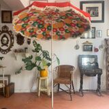 Large floral tilting beach umbrella with cotton fringes, 1960