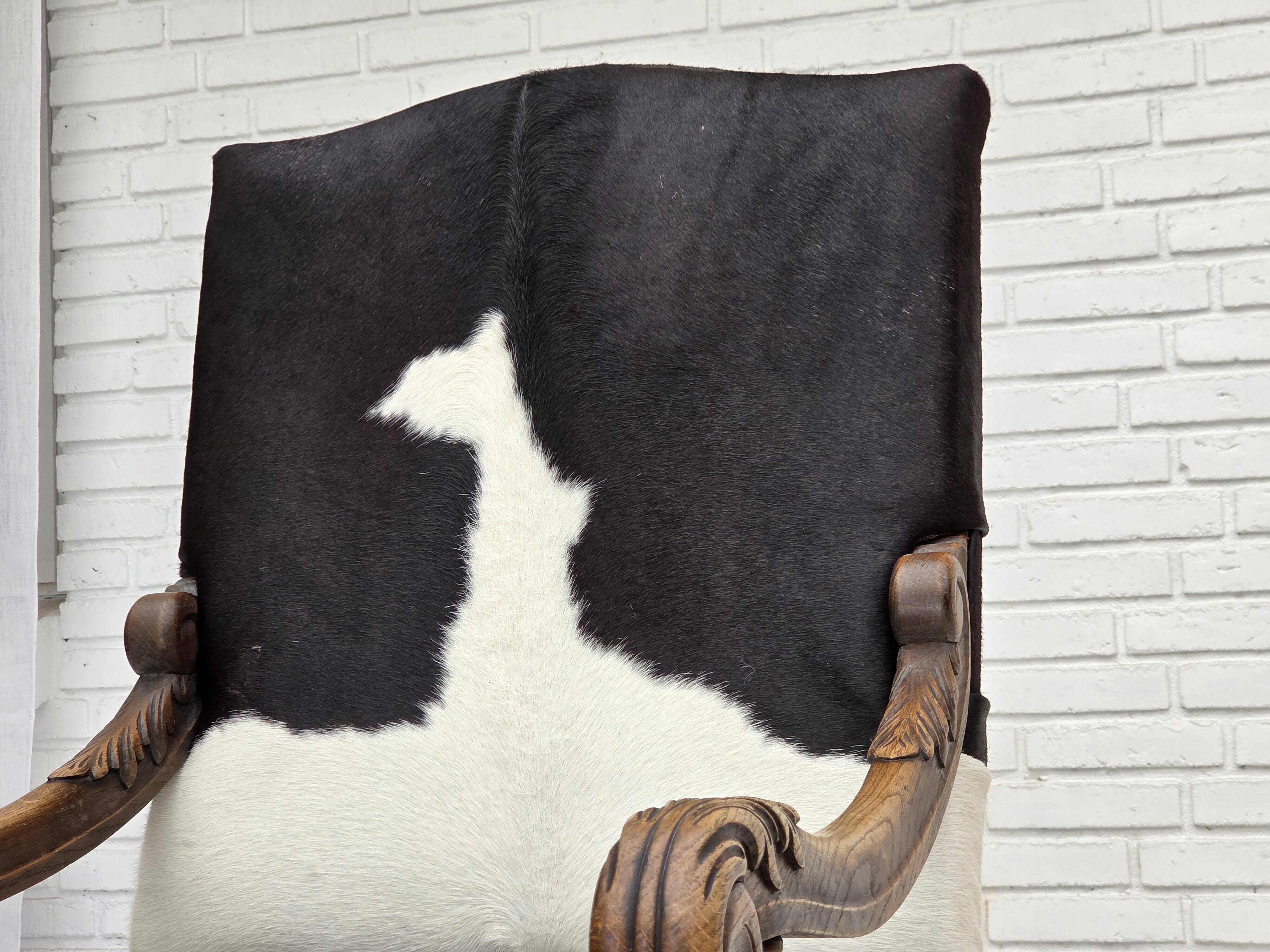1950s, Danish highback armchair, genuine cowhide, oak wood.