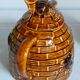 Set of old teapots and honey pot