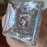 Old carafe in pressed glass grape cluster style