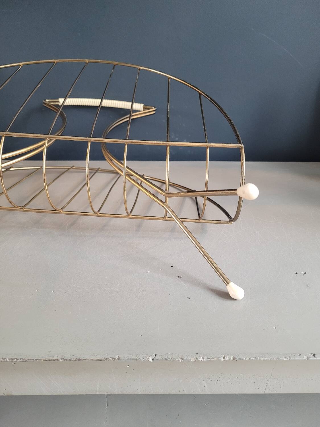 Vintage gold metal magazine rack