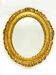 Miroir ancien ovale en bois doré