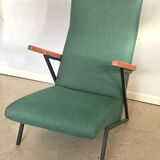 Lounge or easy chair with armrests