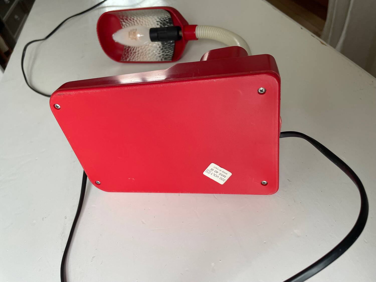 Vintage red articulated desk lamp Italy