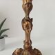 Antique 19th-century solid gilded bronze candlestick in the Louis XV style.