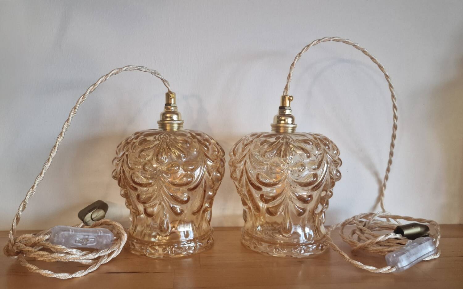 Duo of amber molded glass portable lamps