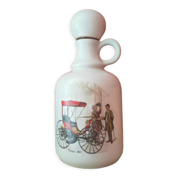Porcelain carafe with antique decorations