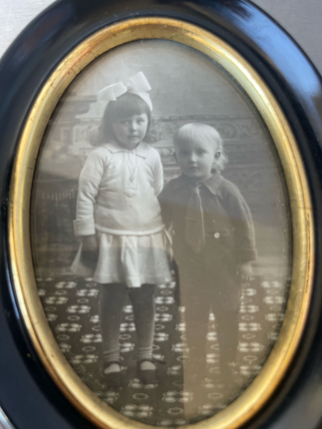 Pair of black wooden oval frames 1880’s  each 13 cm x 10 cm glass measurements 8.5 cm x 5.5 cm