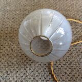 Glass ball suspension