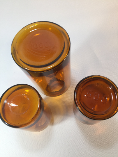 Lot of three pharmacy flasks