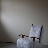 Henning Kjærnulf, armchair reupholstered in long-haired Icelandic sheepskin, 1950