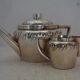 Teapot and milk jug English silverware