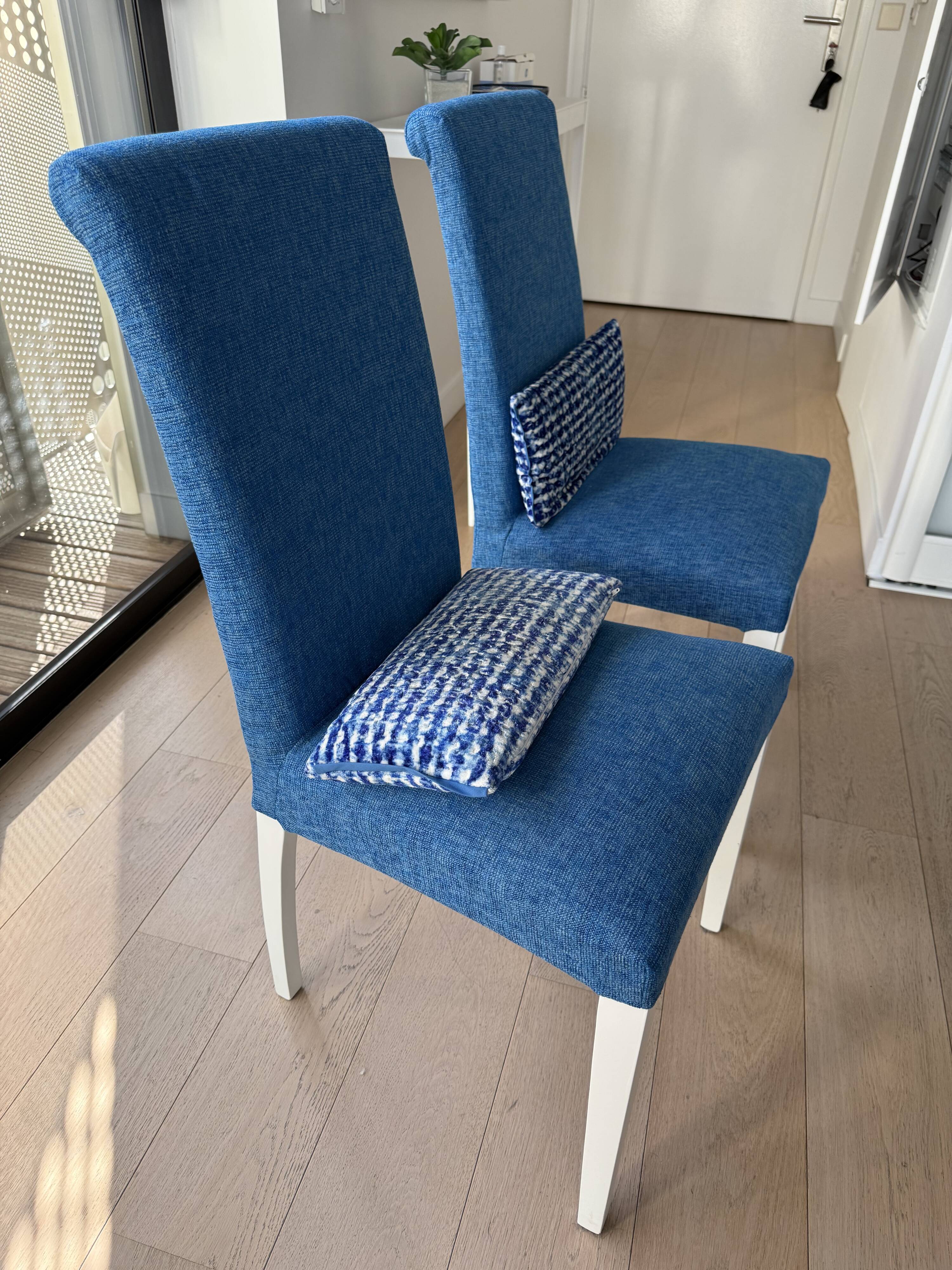 Set of 4 Calligaris chairs with Designers Guild covers.
