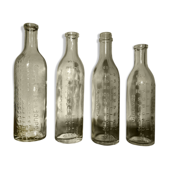 Graduated pharmaceutical bottles