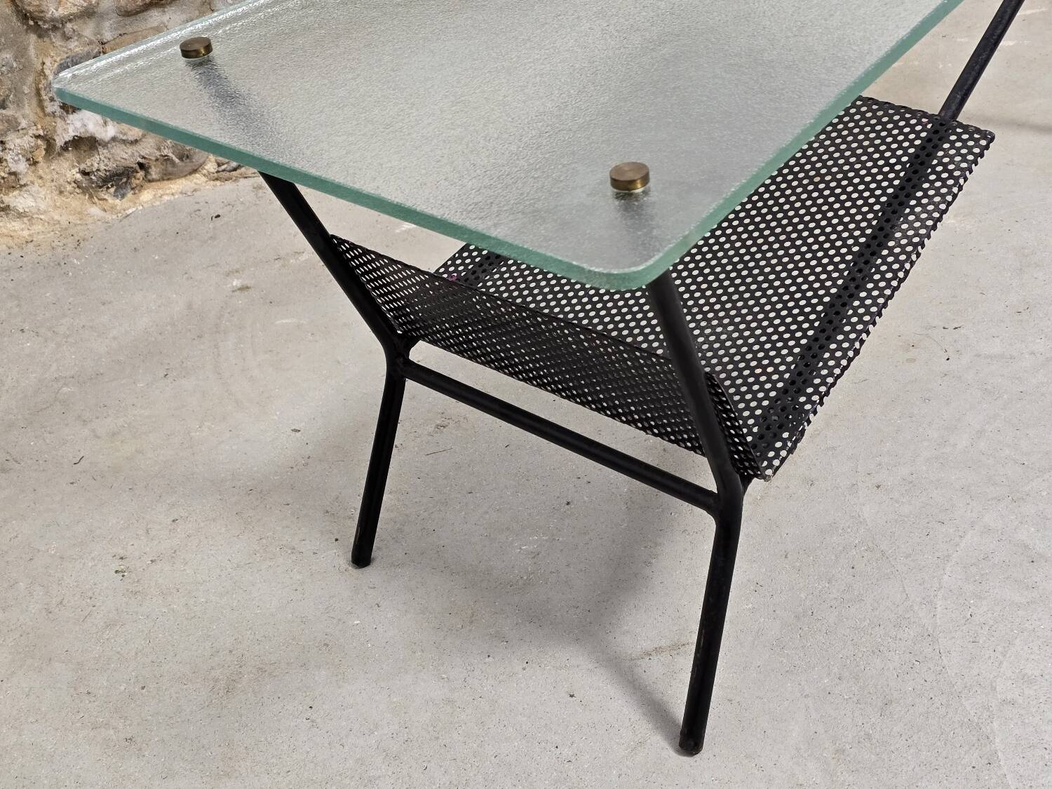 Coffee table in glass and black lacquered metal
