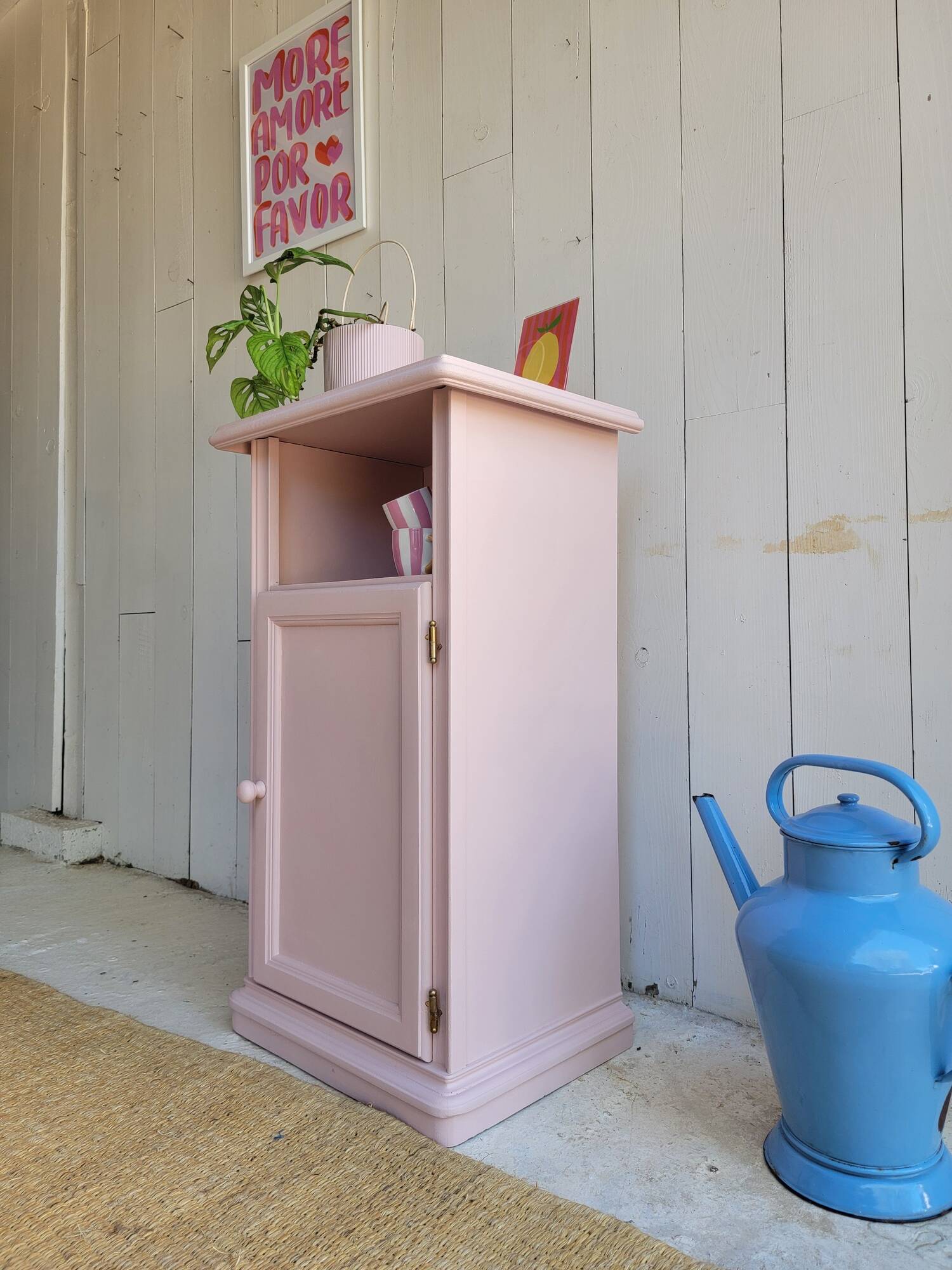 Antique bedside table revamped in pink.
