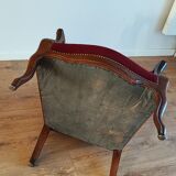 Red voltaire armchair
